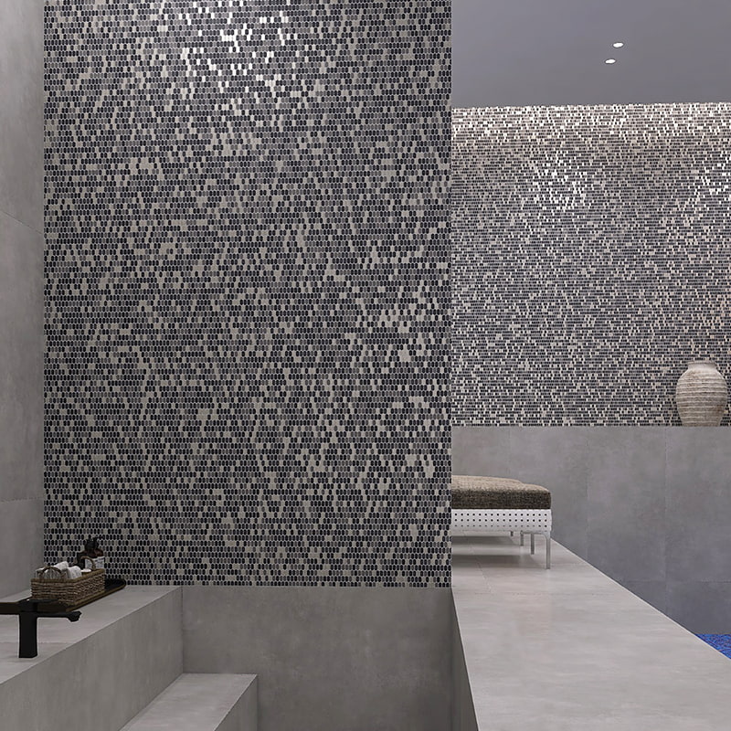 Sleek gray glass mosaic tile wall in a contemporary indoor space