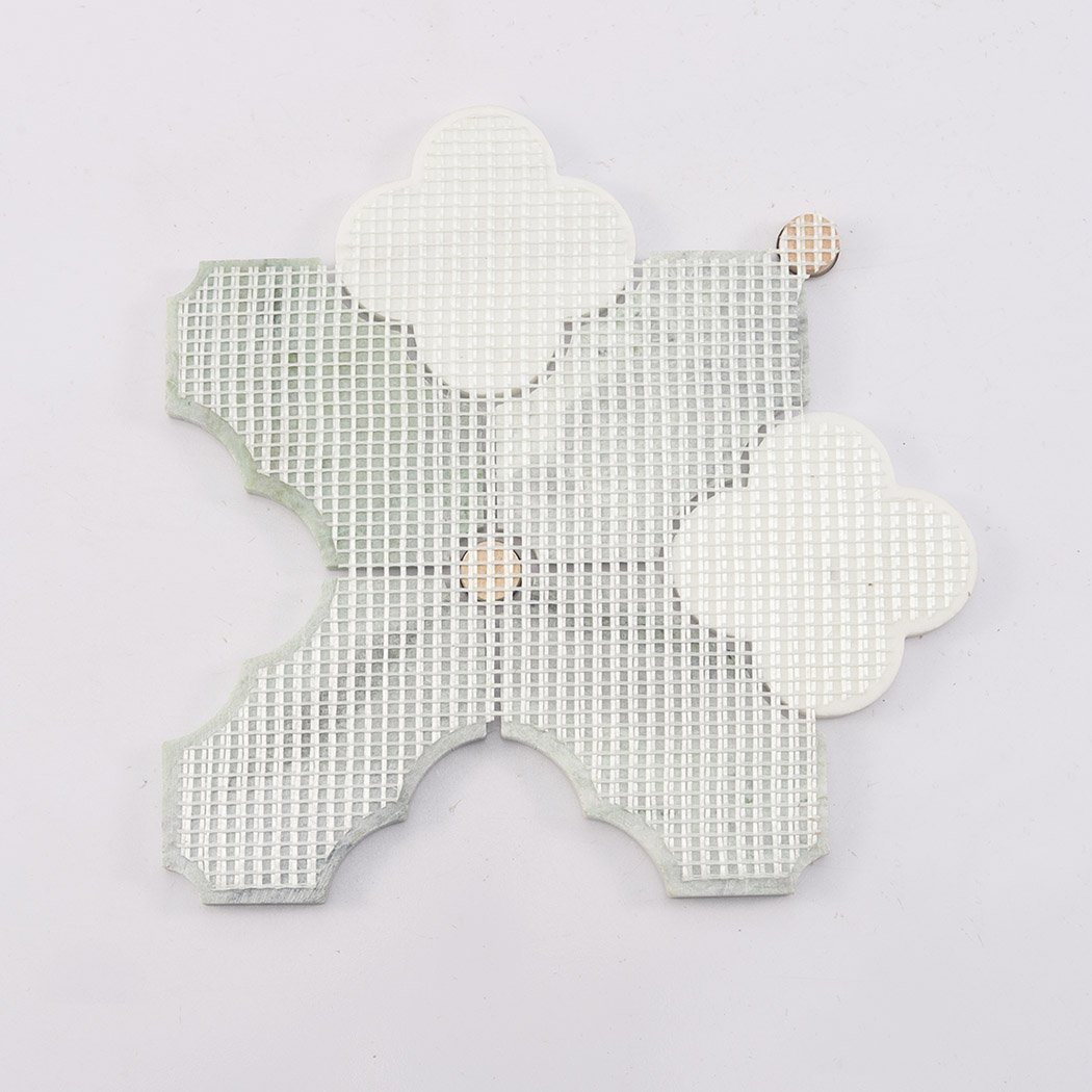 Back view of green arabesque marble mosaic tile with mesh backing