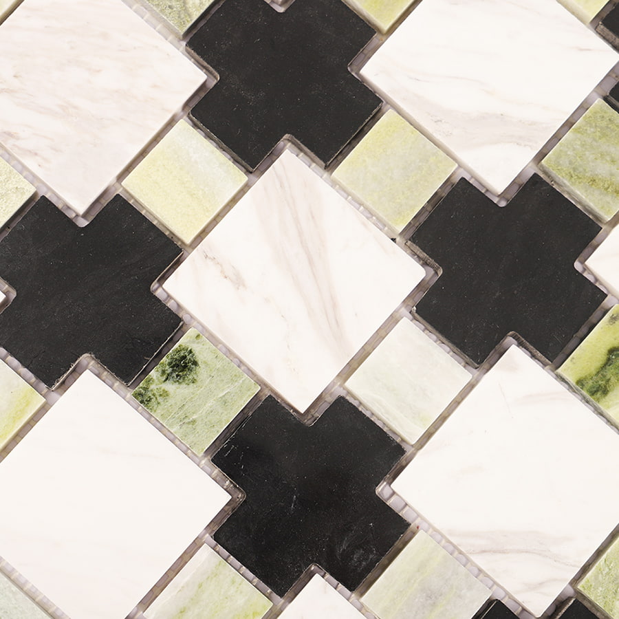 Detailed view of green black and white marble mosaic tile geometric pattern.