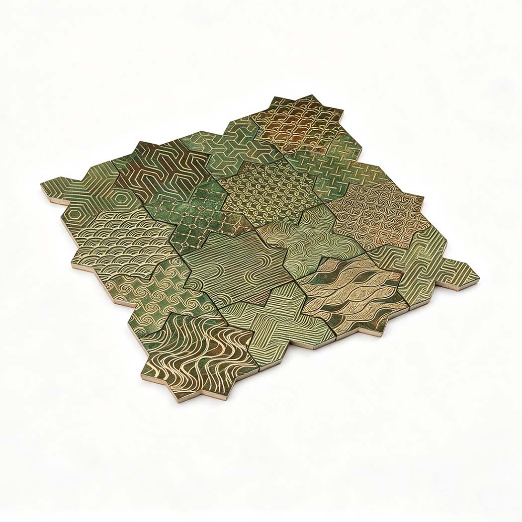Angled studio view of green copper finish aluminum star cross tile