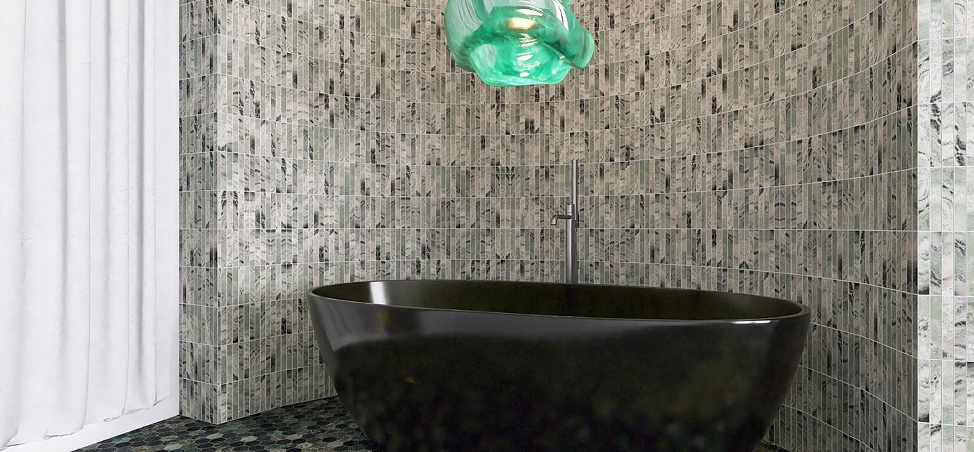 Curved green marble tile wall design in a contemporary bathroom with a black bathtub 