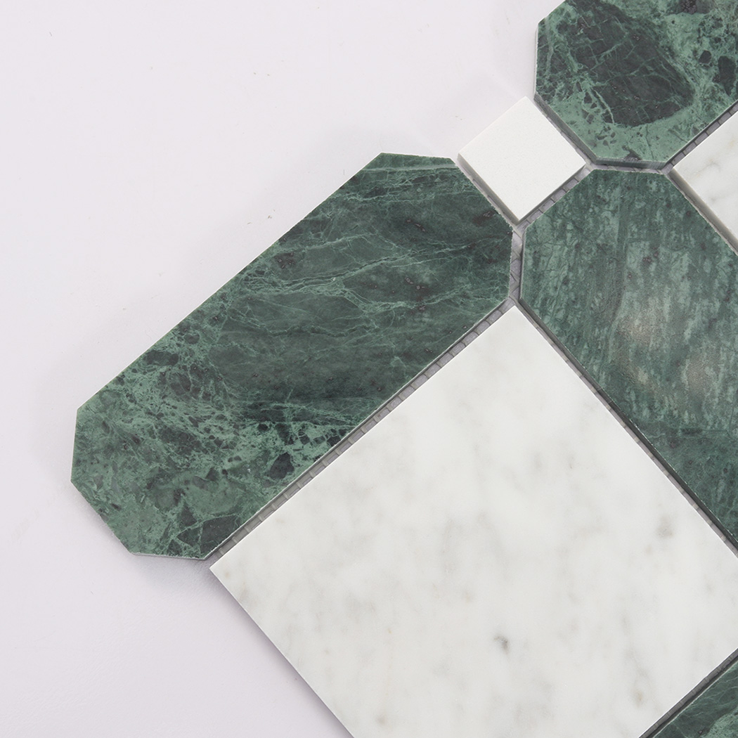 Close up of green marble frame and white square marble tile detail