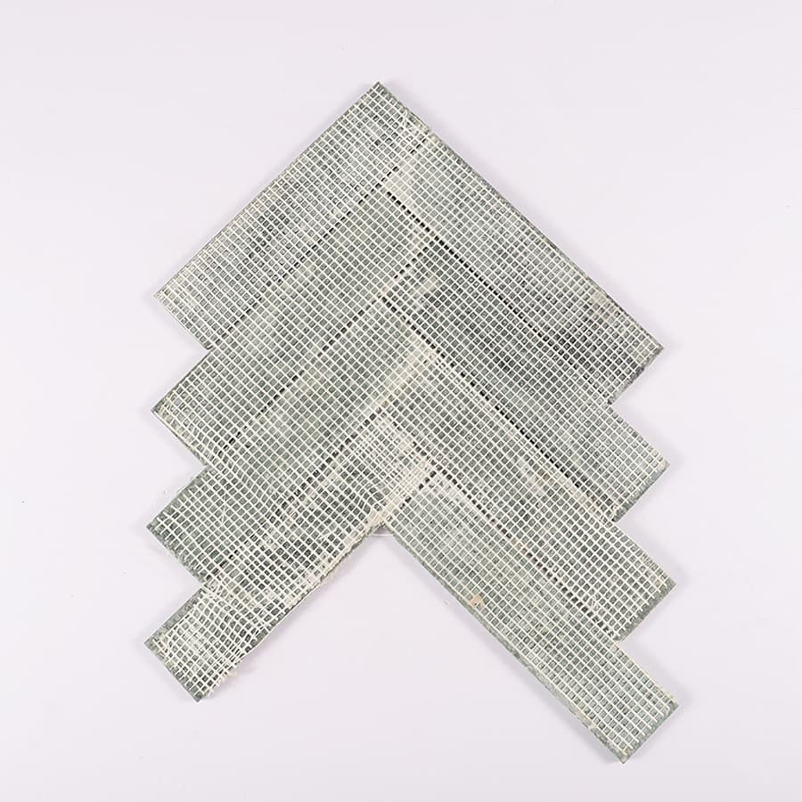 Back mesh view of green marble herringbone mosaic tile