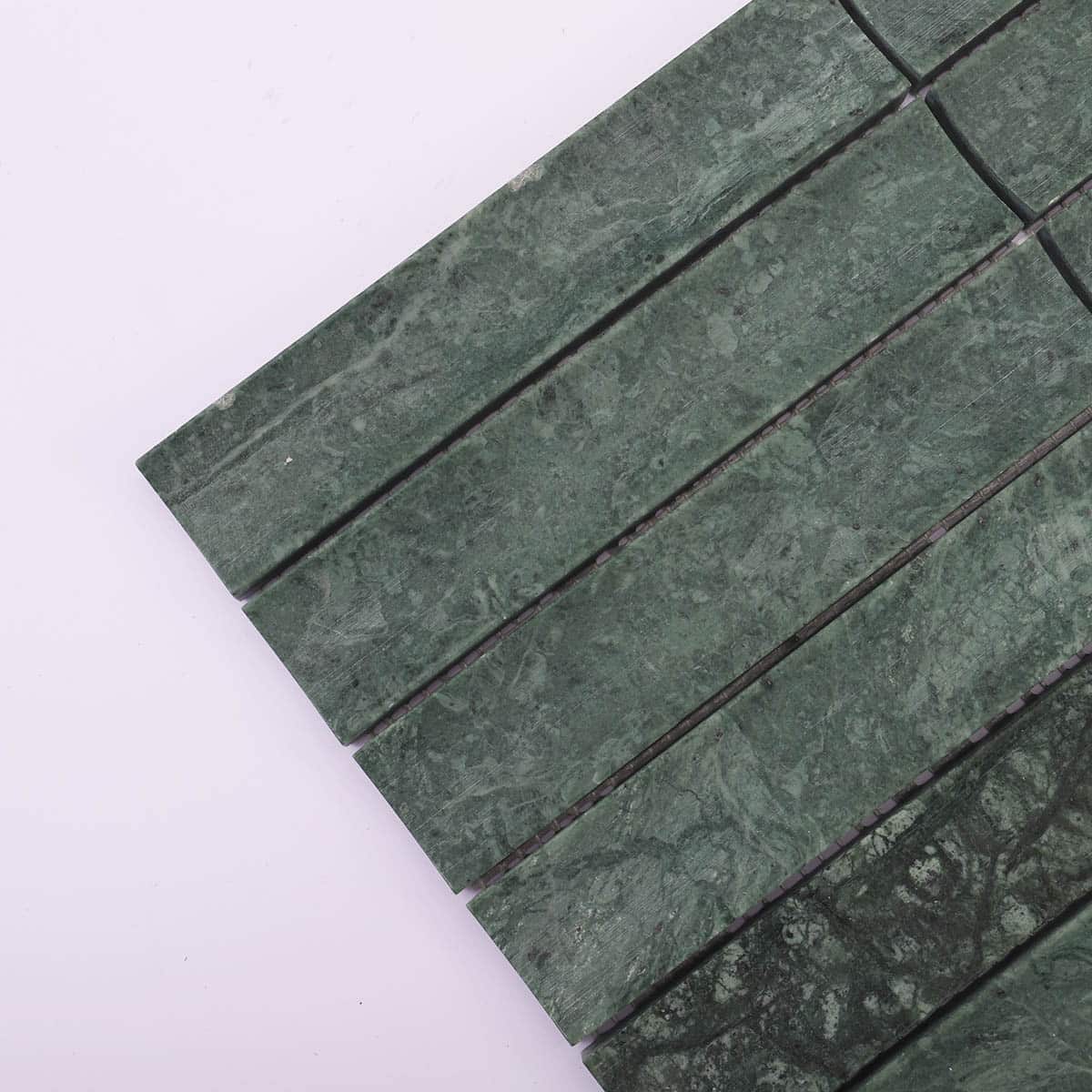 Corner close-up of green marble stick tile surface