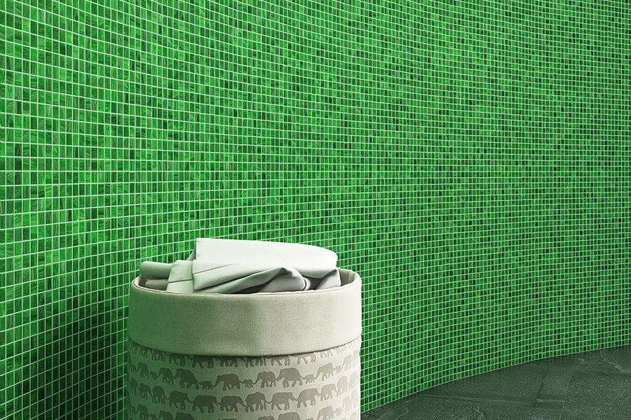 Green square mosaic tiles used for a dynamic, modern wall design