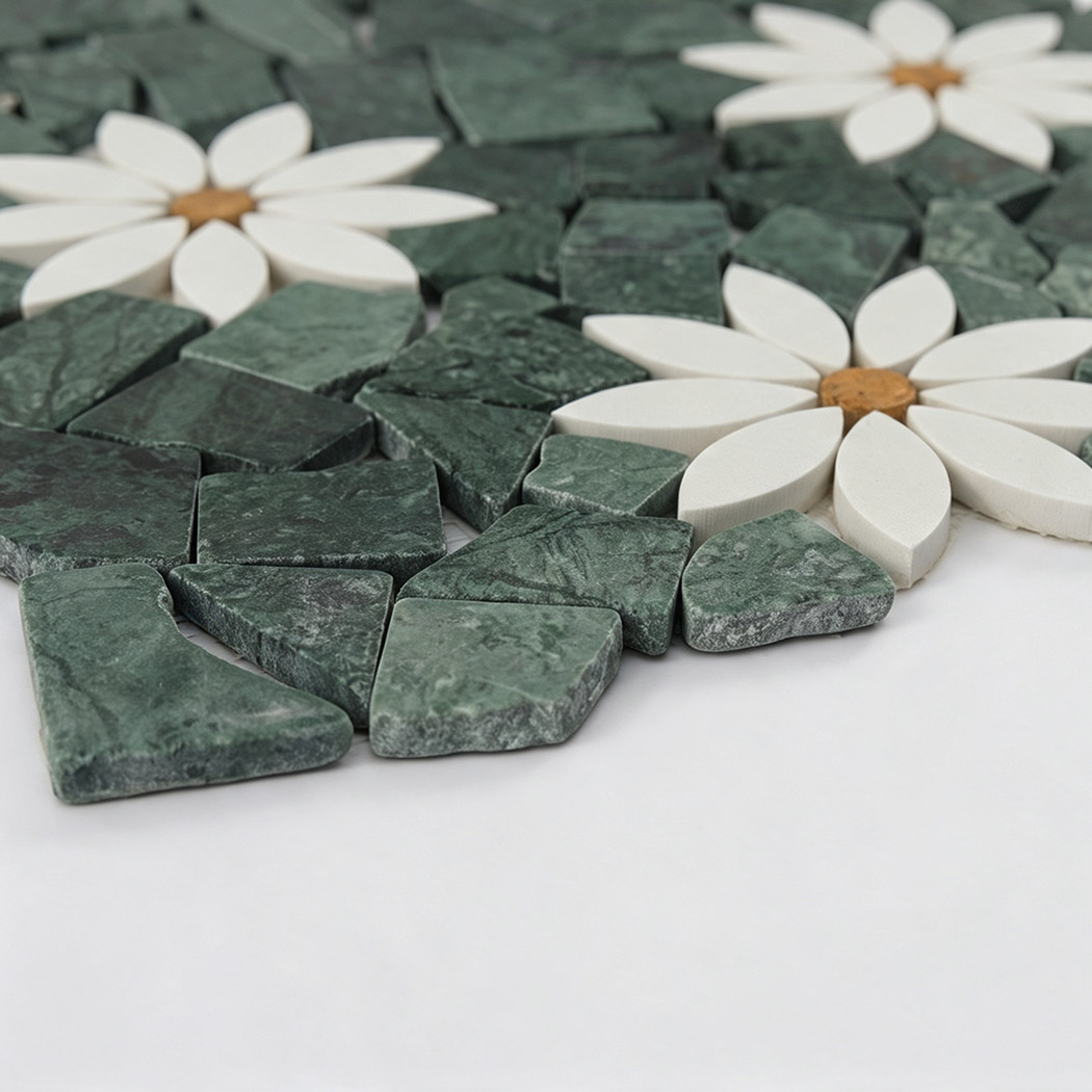 Angled view showing the thickness of green marble and white flower mosaic tile