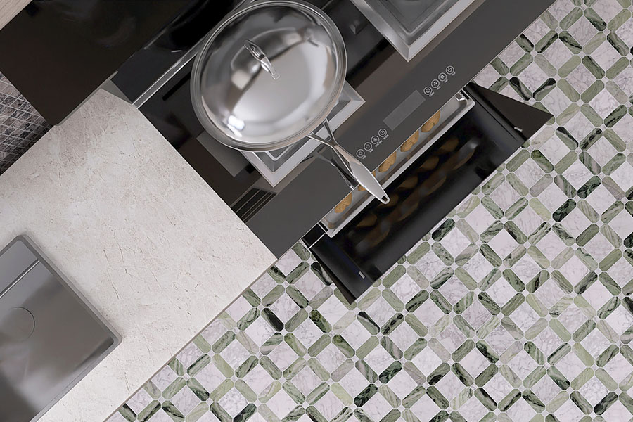 Green and white marble basketweave floor tile in a modern kitchen