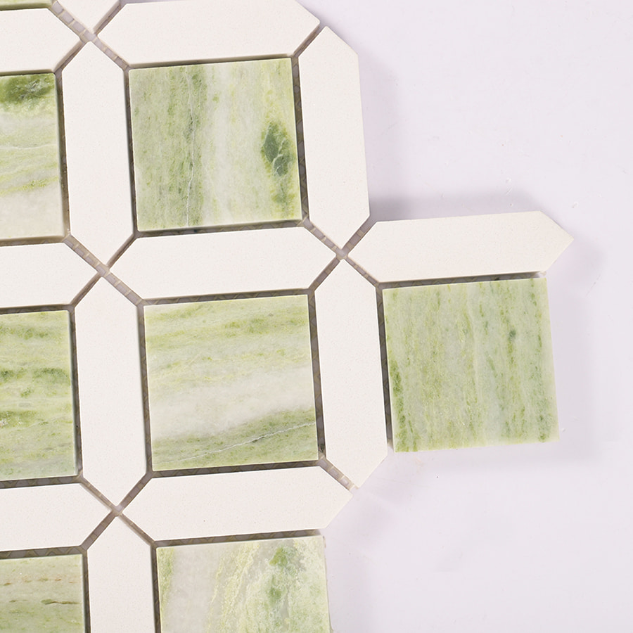 Corner close-up of green and white square marble mosaic tile