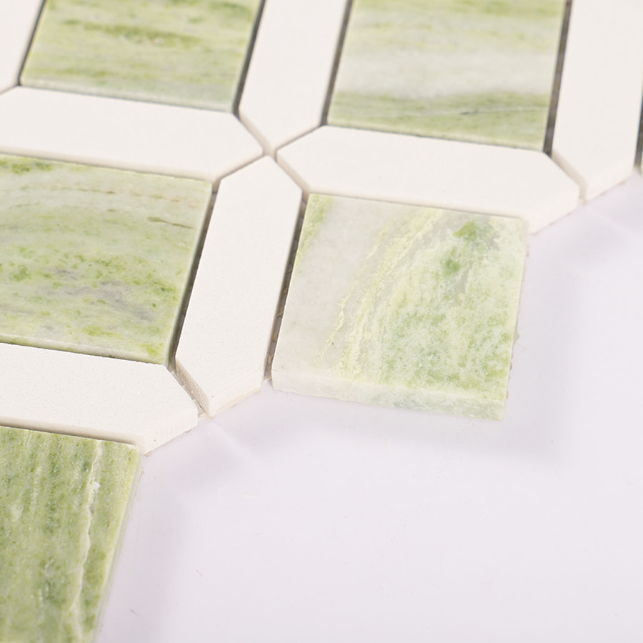 Edge close-up showing thickness of green and white marble tile