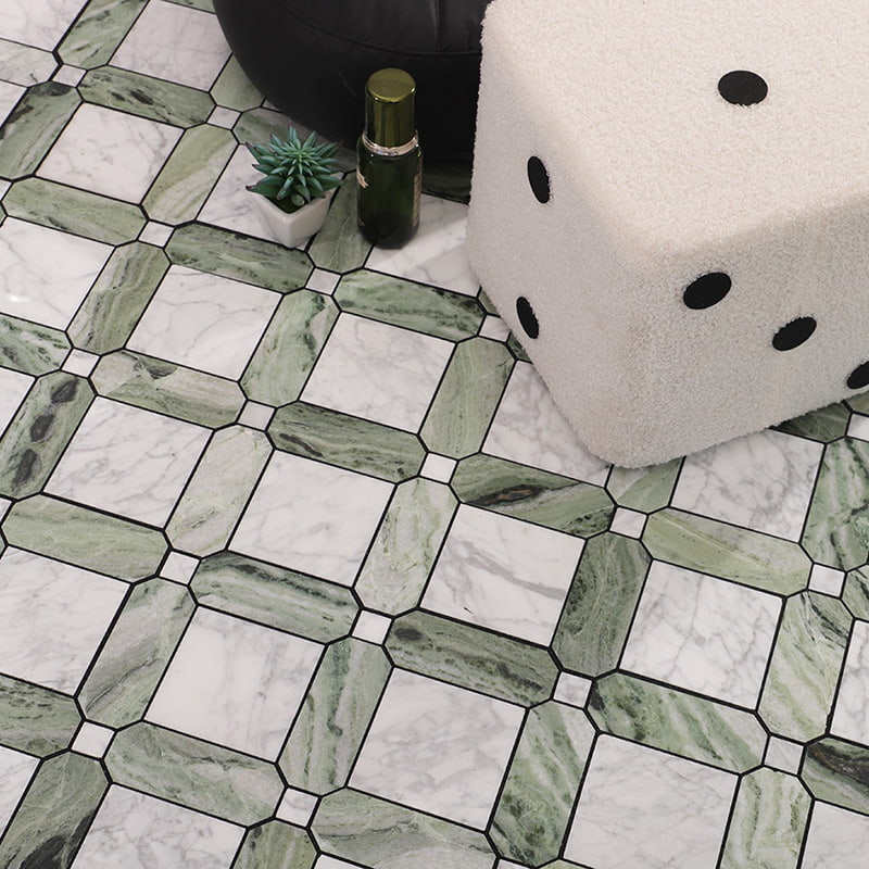 Green and white marble patterned floor tiles with a dice-shaped stool.