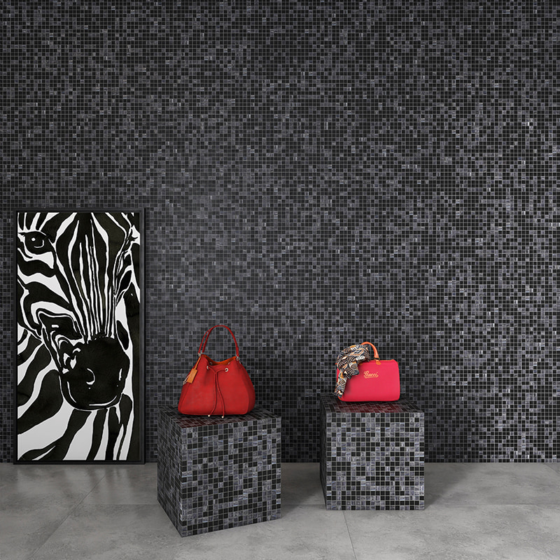 Dark grey black glass mosaic tile wall with retail display stands