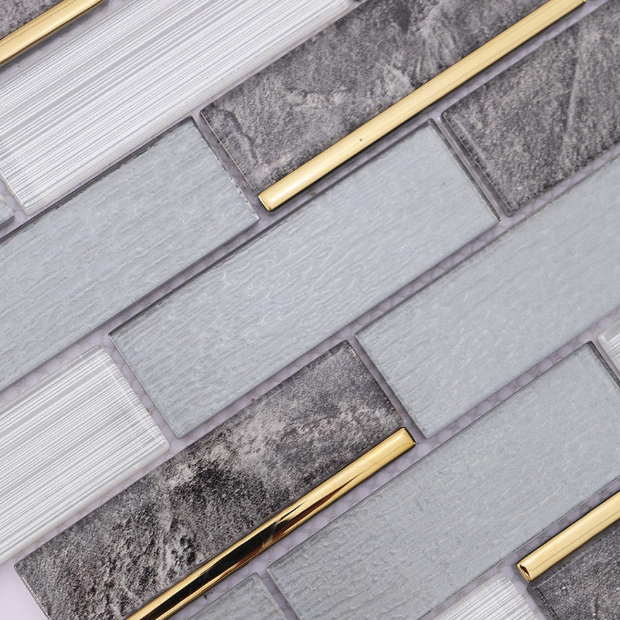 Surface detail of grey white gold line glass mosaic tile with matte and glossy mix