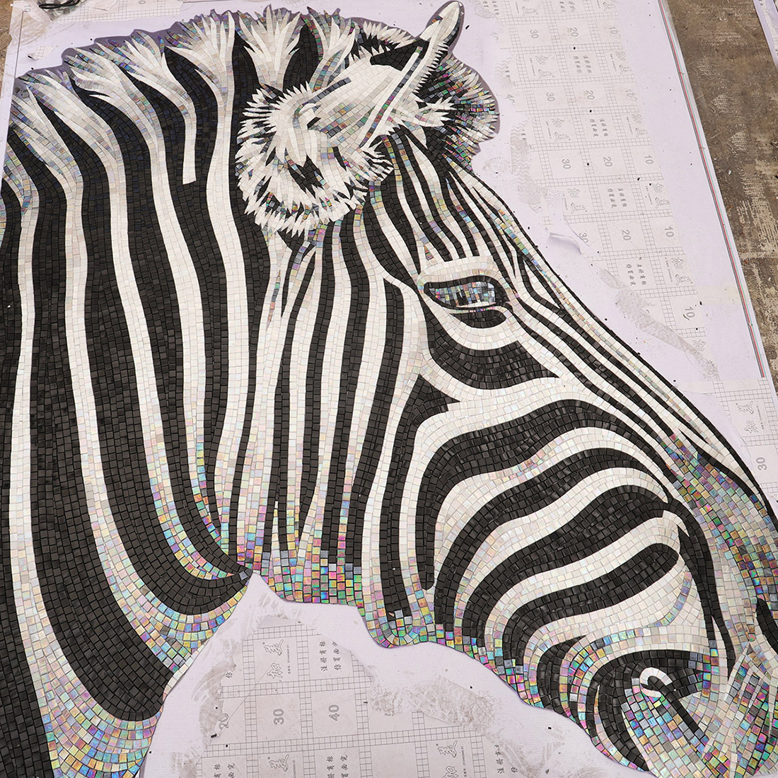 Handmade zebra glass mosaic mural shown on a production layout sheet