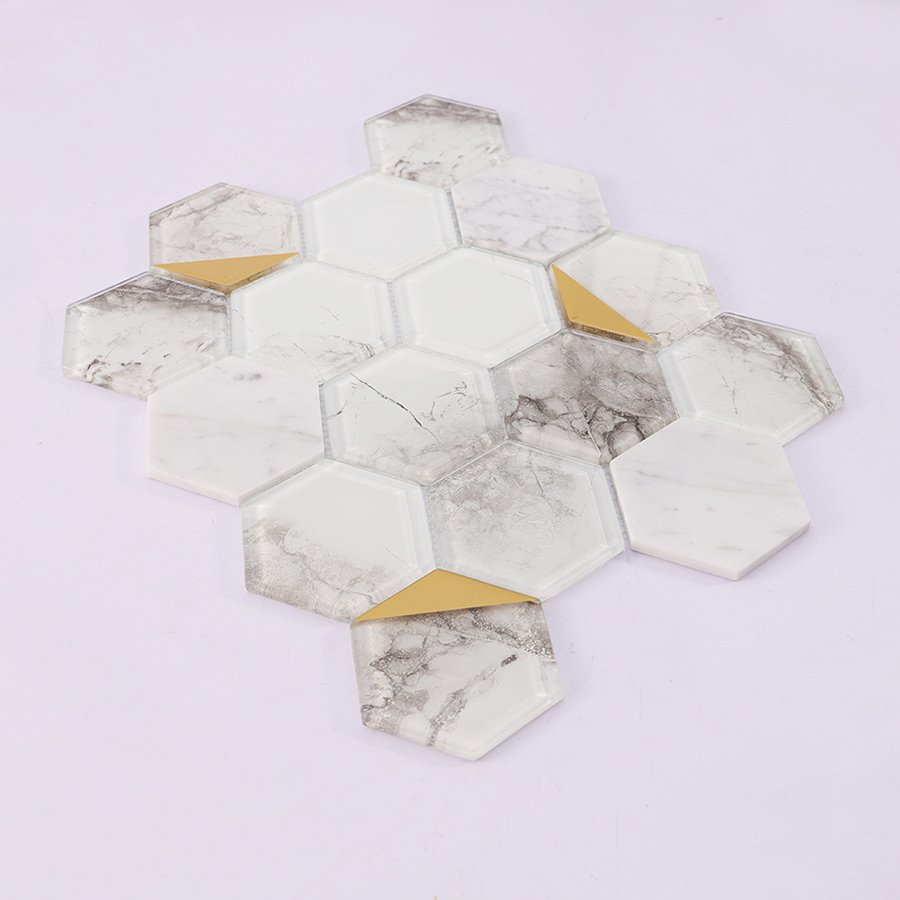 Side angle view of marble and gold hexagon mosaic tile sheet.