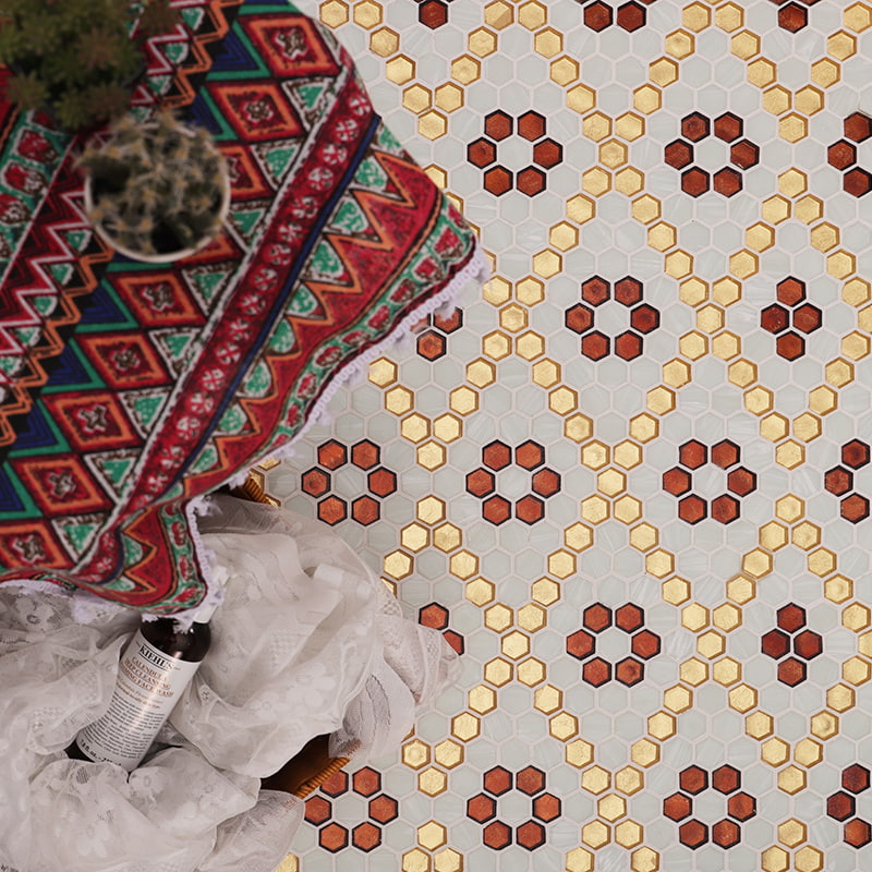 Hexagon tile pattern with red flower motif and gold outlines