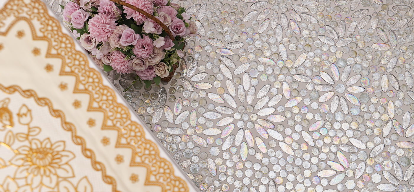 Iridescent flower-pattern mosaic tiles reflecting light in a beautiful design