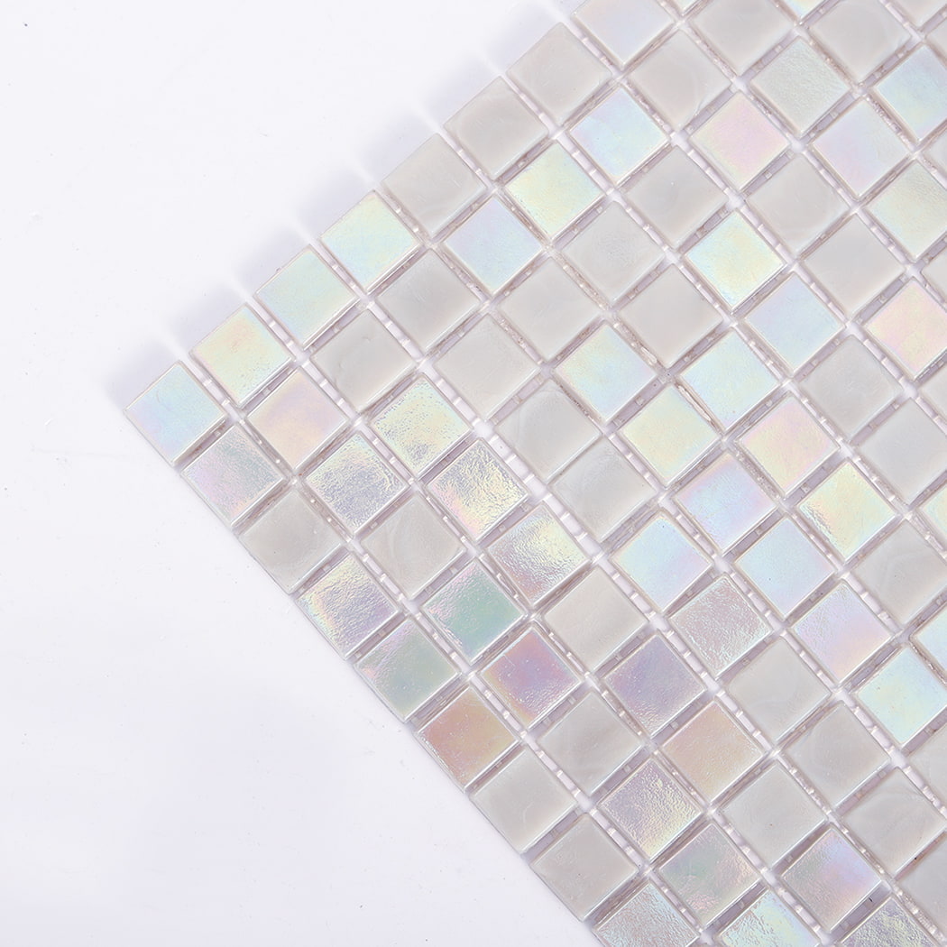 Corner closeup of iridescent light gray square glass mosaic tile with glossy finish