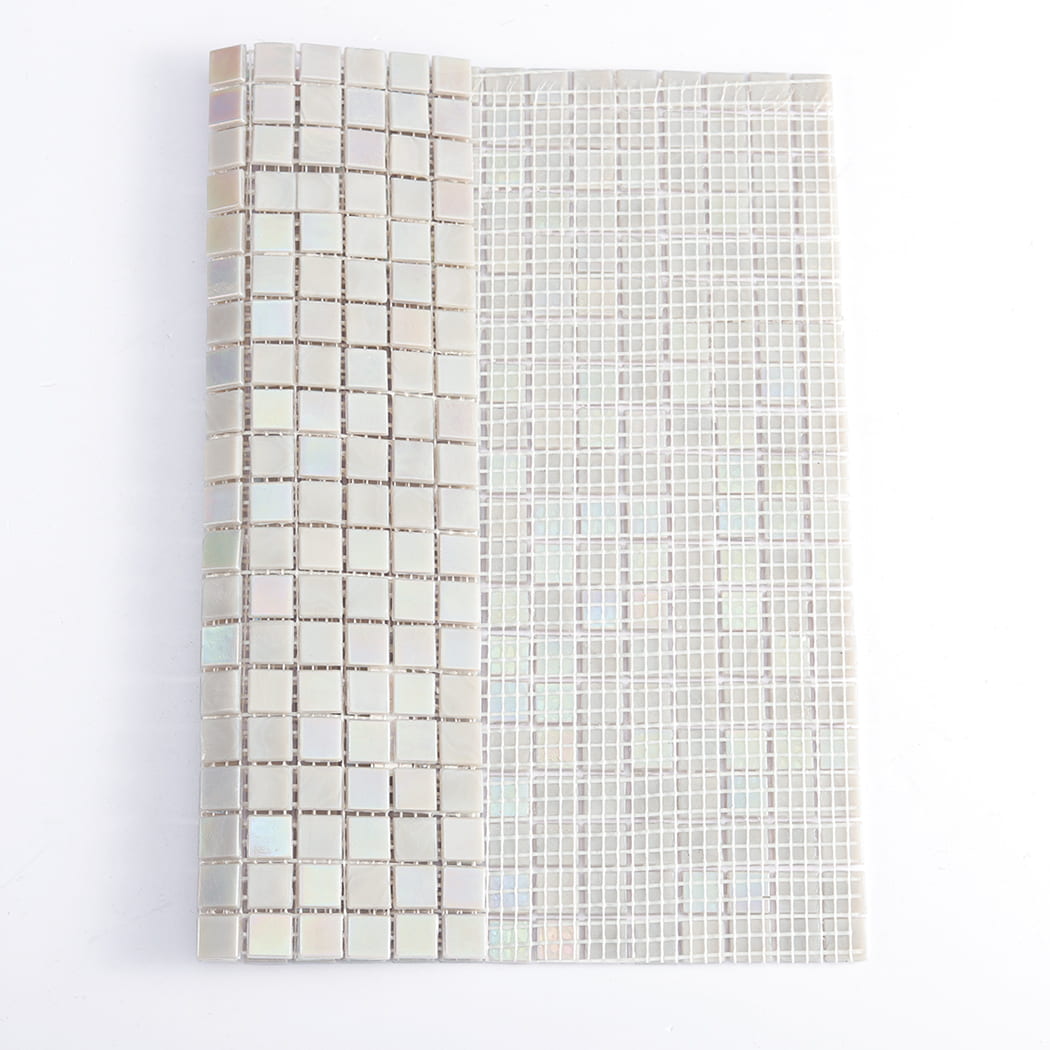 Iridescent light gray square glass mosaic tile showing face side and mesh backing