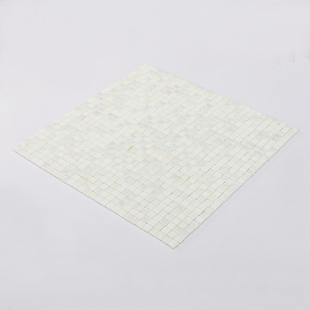 Angled view of iridescent white mini square glass mosaic tile sheet showing sheen