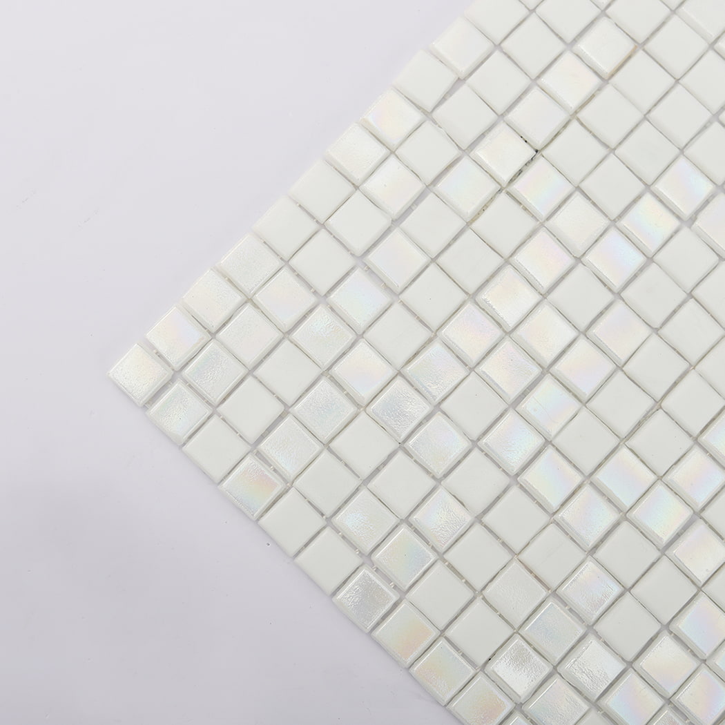 Close-up corner detail of iridescent white mini square glass mosaic tiles