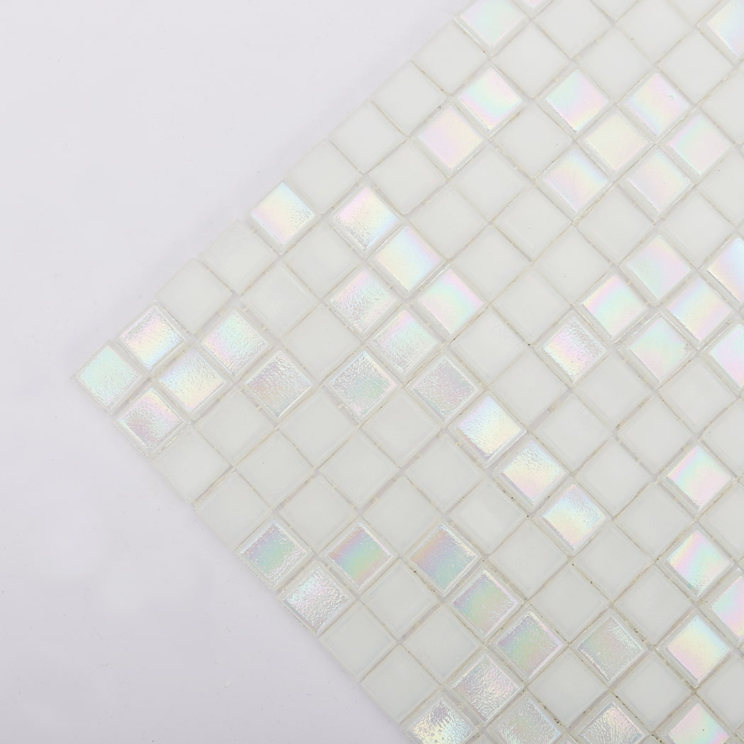 Close-up of iridescent white small glass mosaic tile corner with shimmer