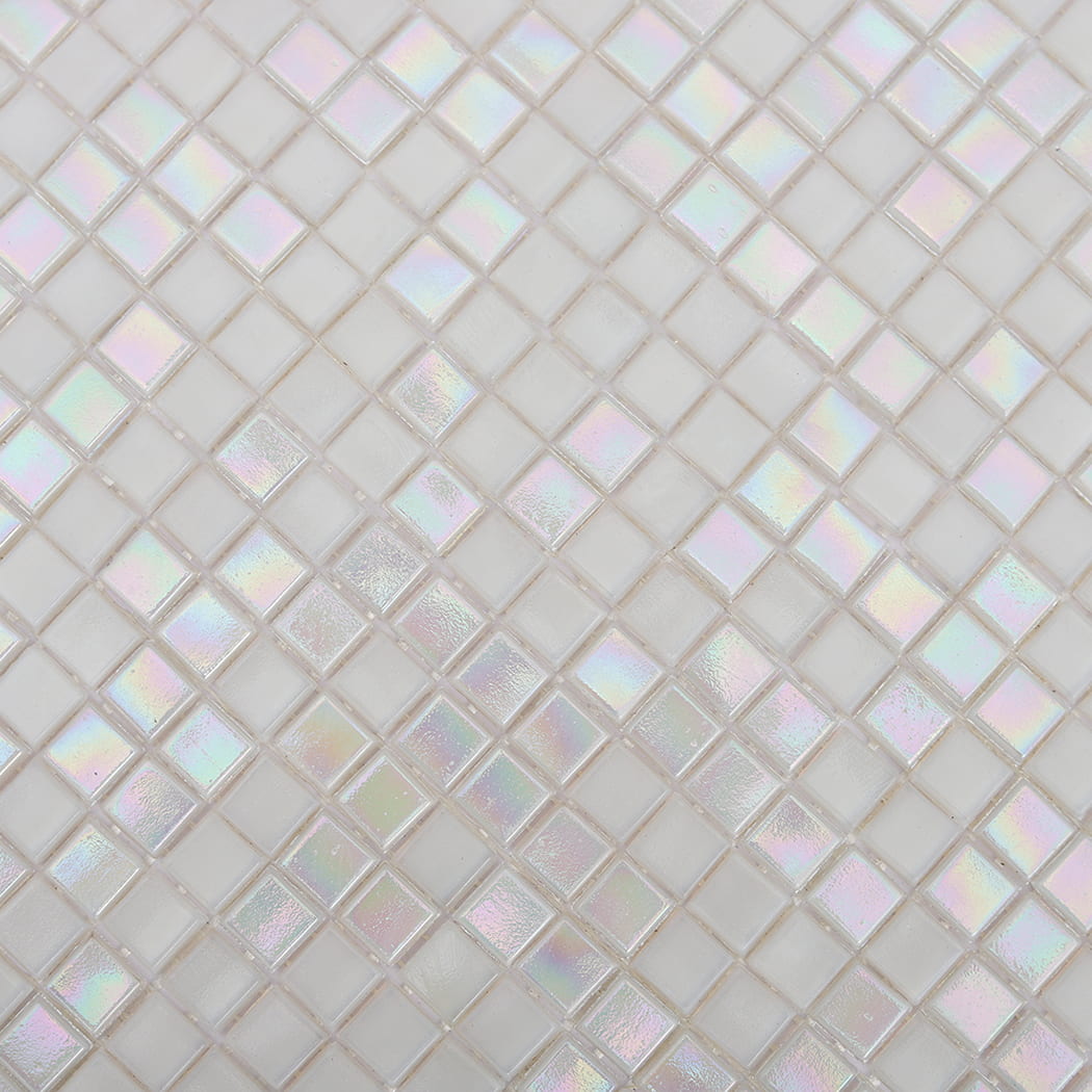 Shimmering surface detail of iridescent white small square glass mosaic tiles