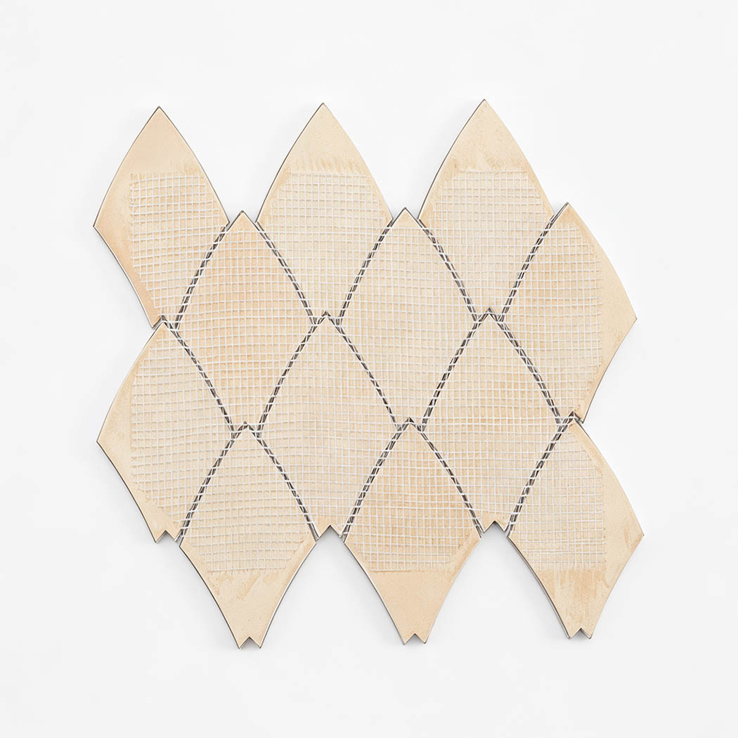 Back view of leaf shape aluminum mosaic tile sheet with mesh backing