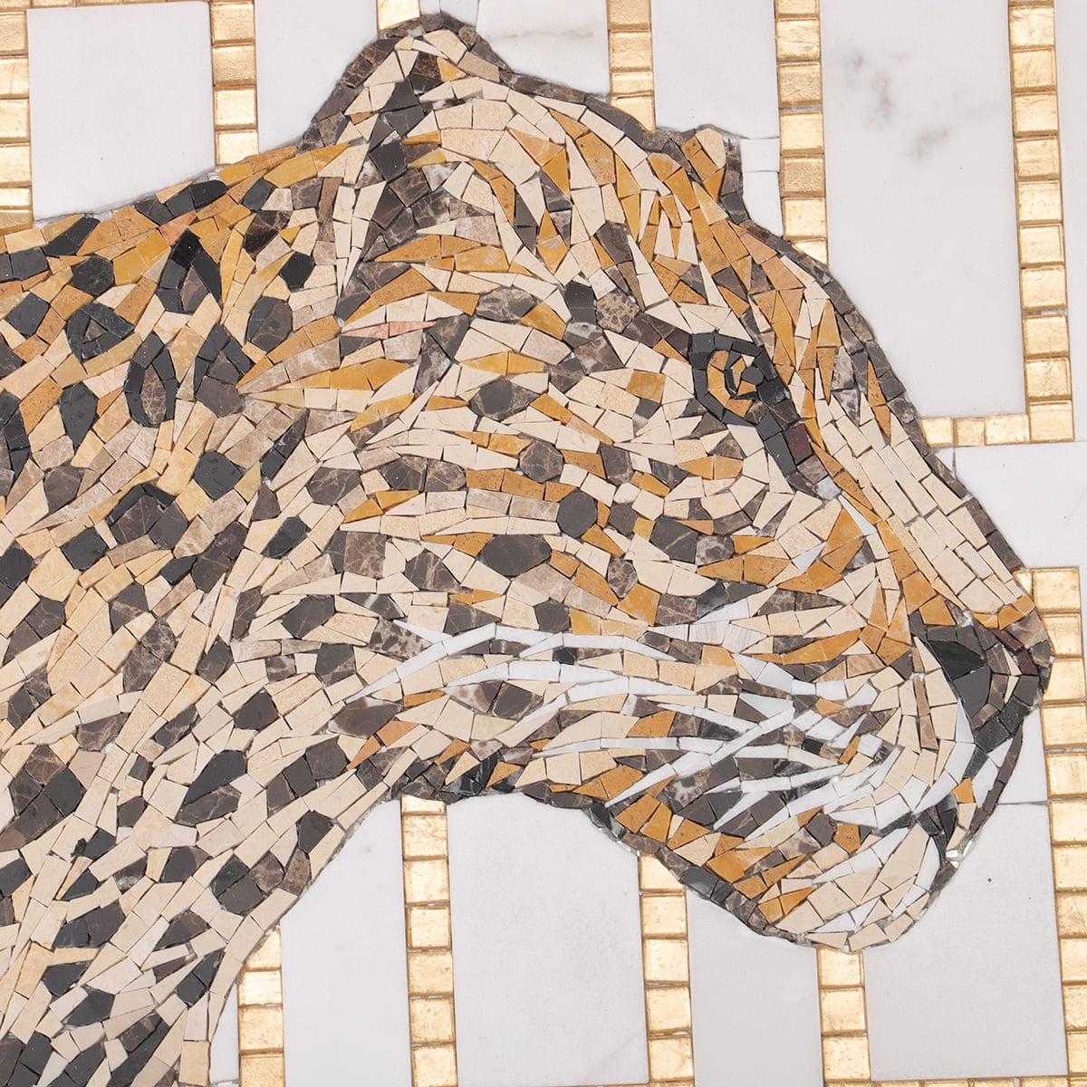 Close-up of a leopard's head made from glass and marble mosaic tiles