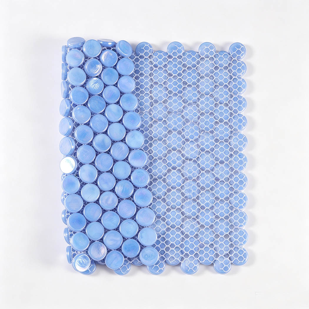 Mesh backing of light blue iridescent round glass mosaic tile sheet