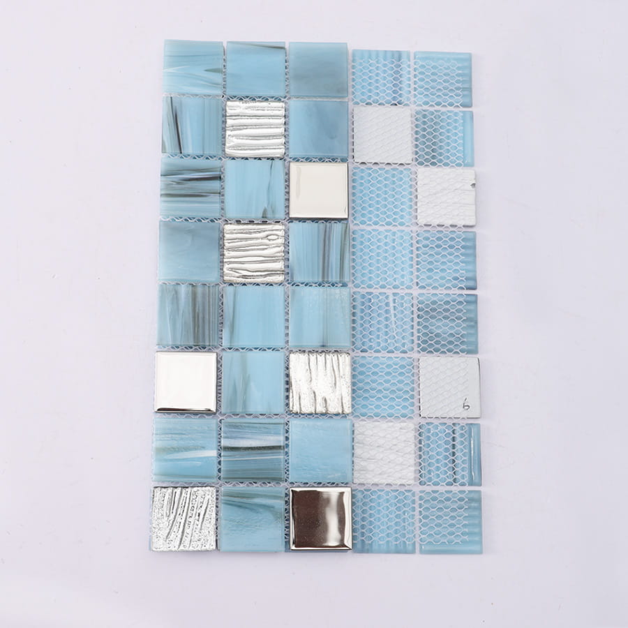 Back side view of light blue mosaic tile sheet showing mesh backing