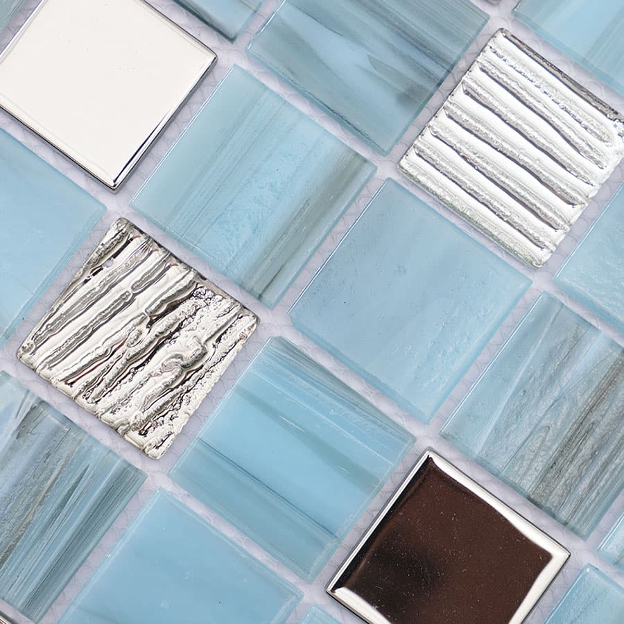 Detailed view of light blue and silver mosaic tiles with glossy finish