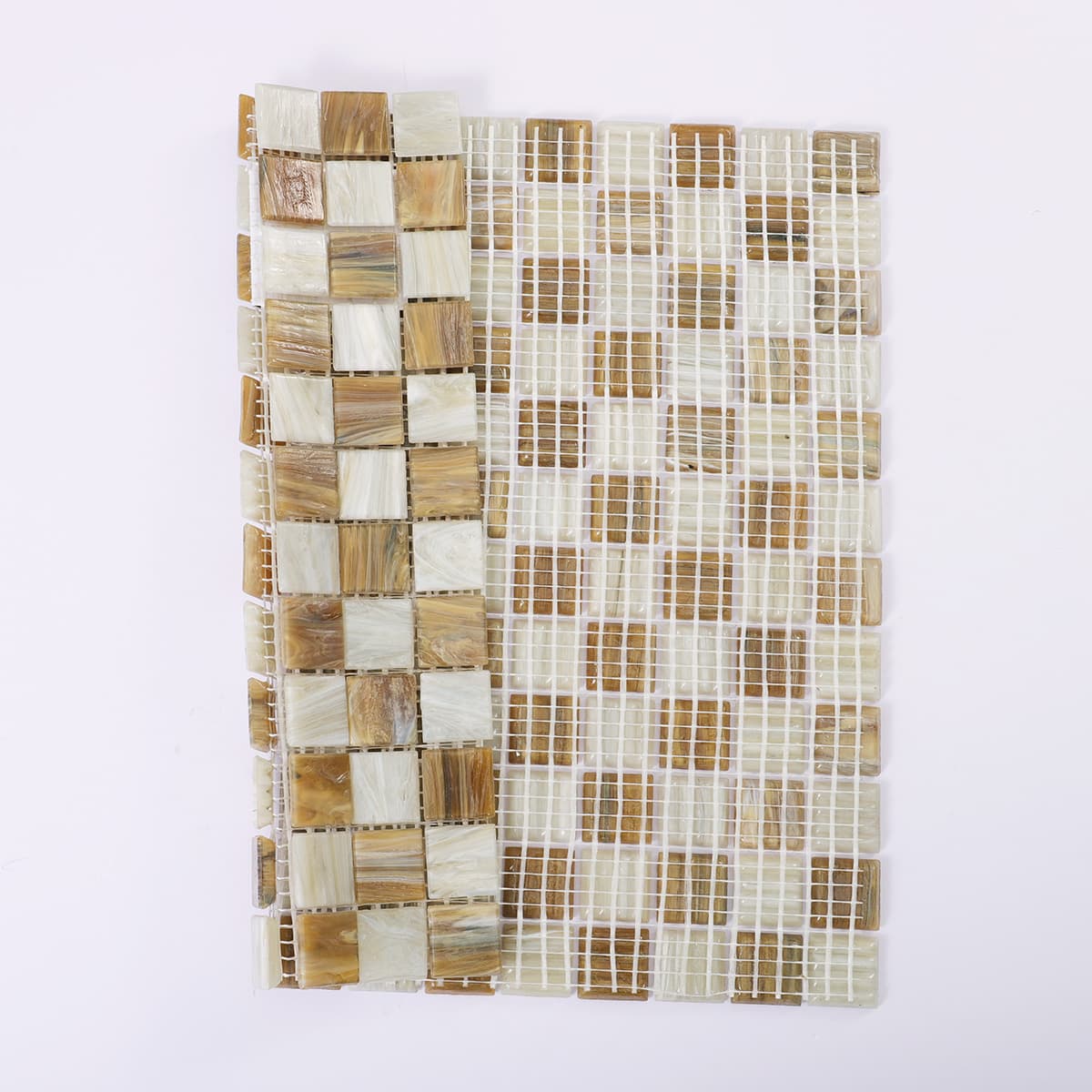 Front and back of light brown and beige glass mosaic with mesh backing