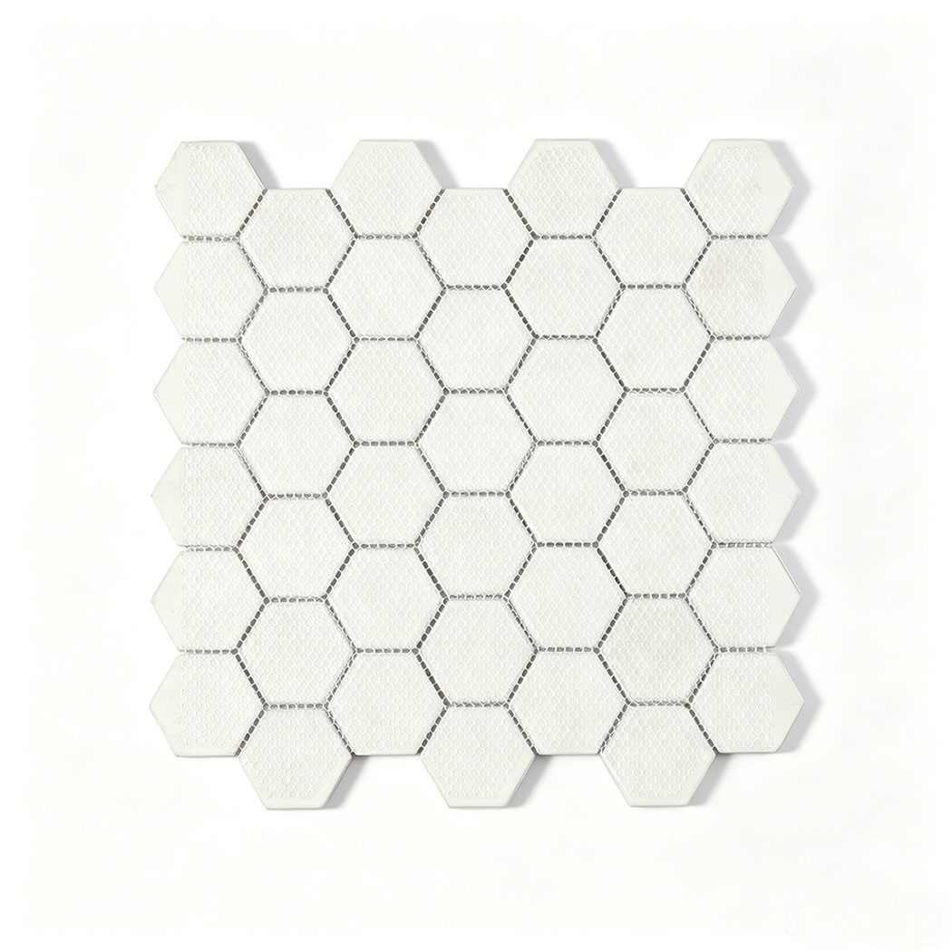 Back view of light gray hexagon glass mosaic sheet with mesh mounted backing