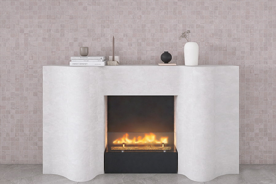 Light gray mosaic tile backdrop adds calm texture behind fireplace