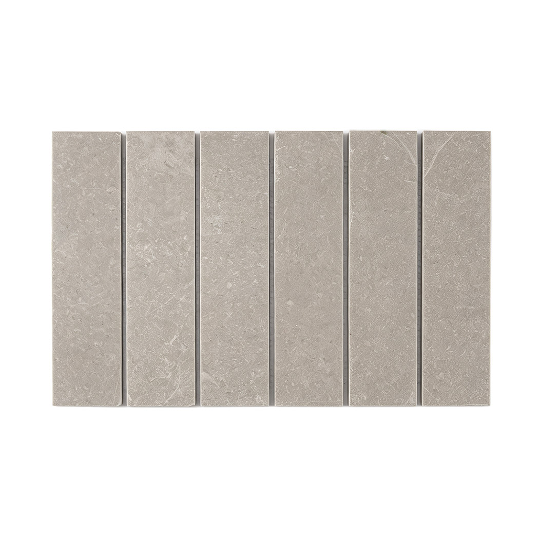 Light gray vertical marble strip mosaic with subtle natural stone markings