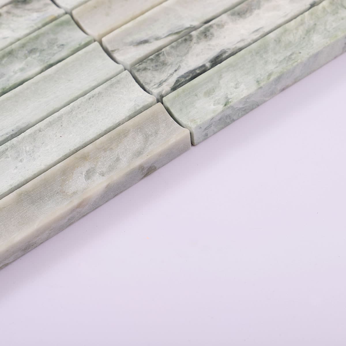 Edge detail of light green fluted marble stick mosaic