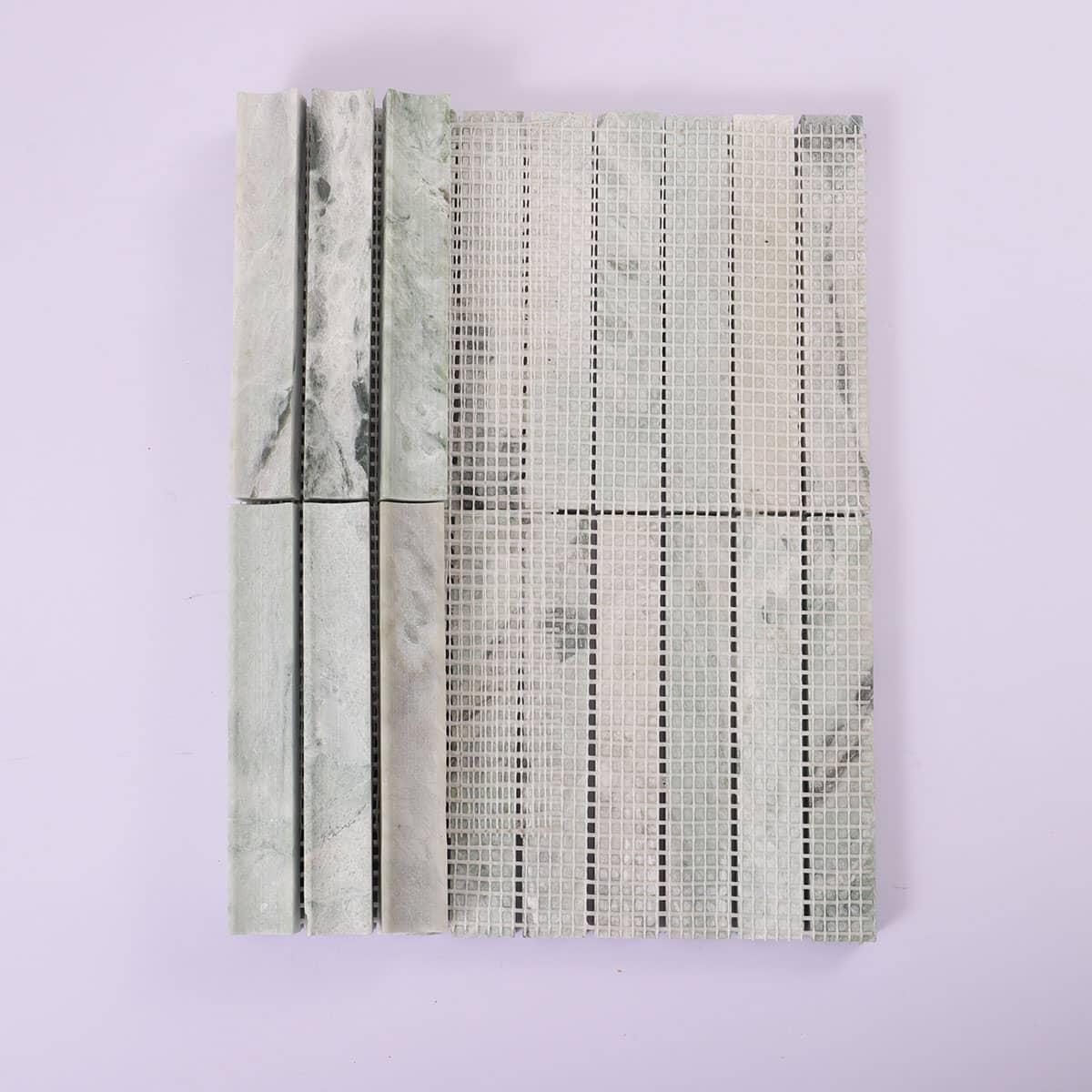 Mesh backing of light green fluted marble stick tile