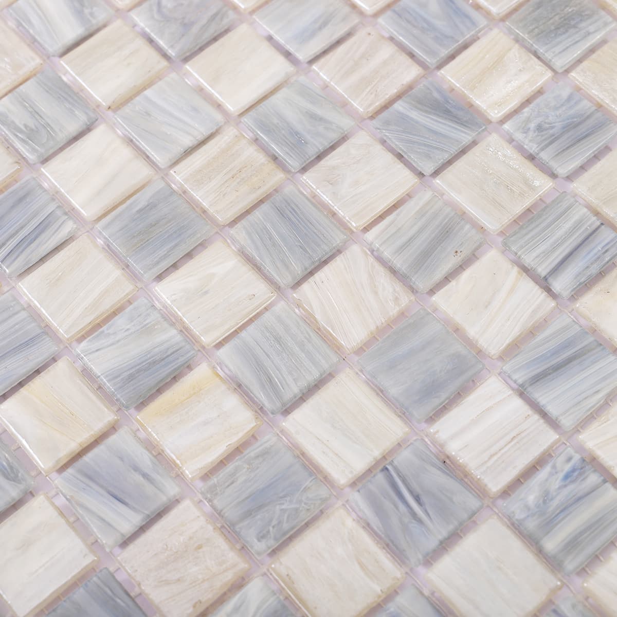 Textured surface view of light grey and blue checkered mosaic
