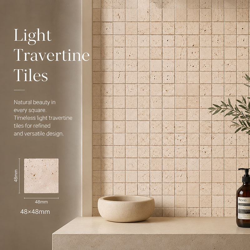 Light travertine 48x48mm tiles used as a soft natural stone vanity backsplash