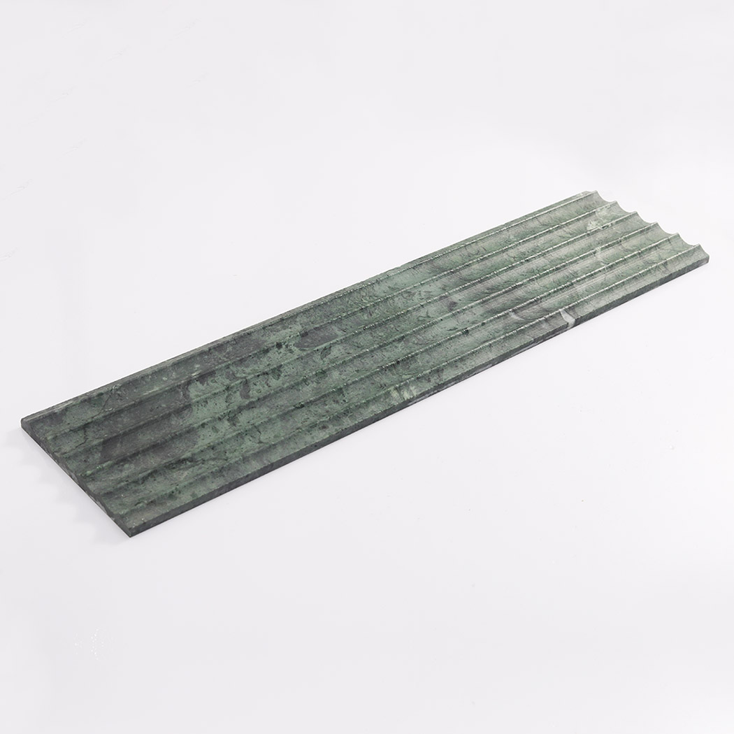Long green marble fluted tile displayed on a clean white background