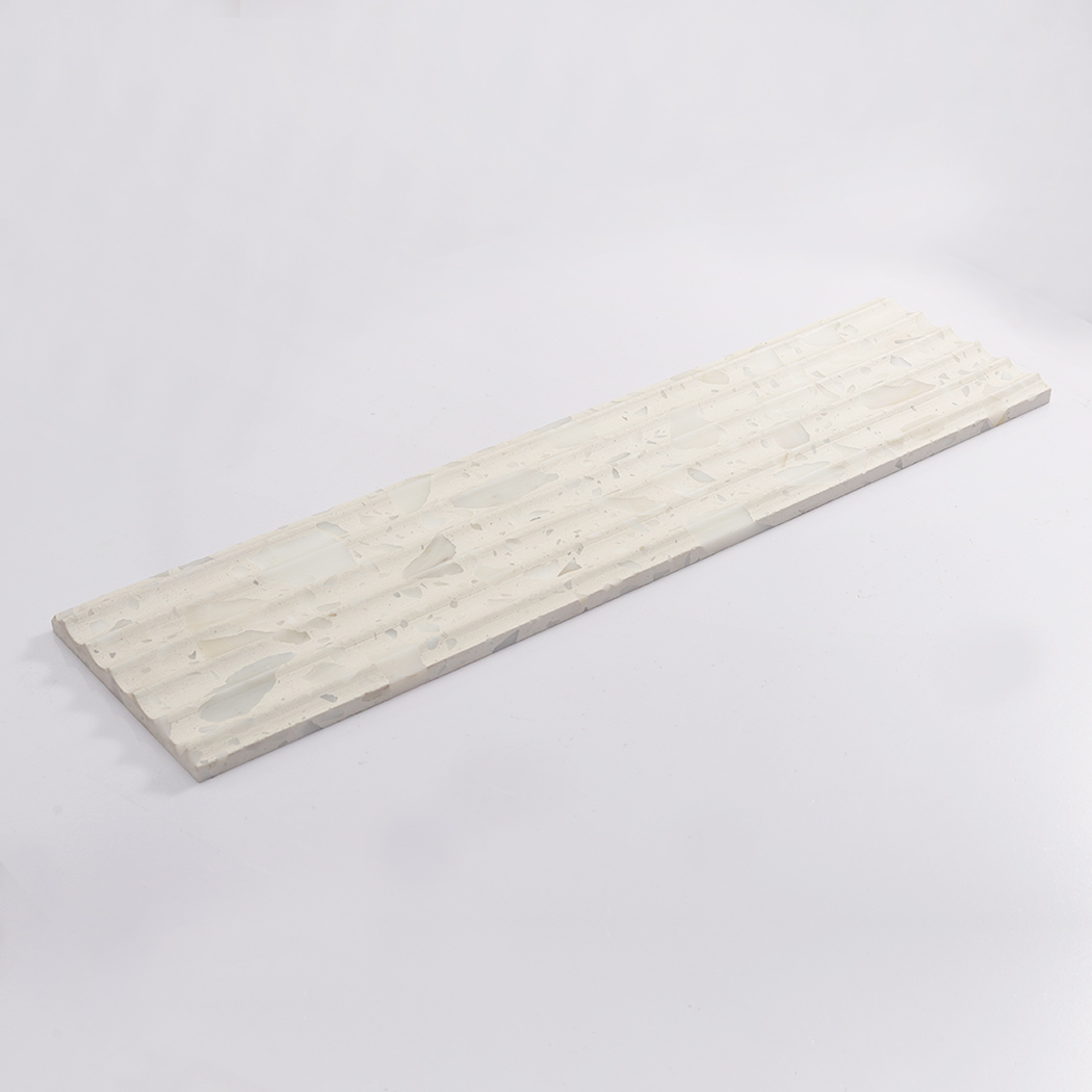 Long white terrazzo fluted tile displayed on a clean white background
