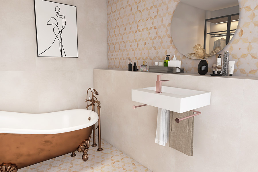 Marble tile bathroom with floral mosaic accent wall and copper bathtub