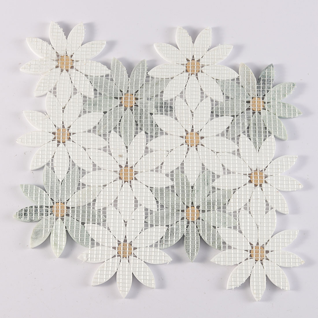Back view of daisy marble mosaic tile sheet showing mesh backing