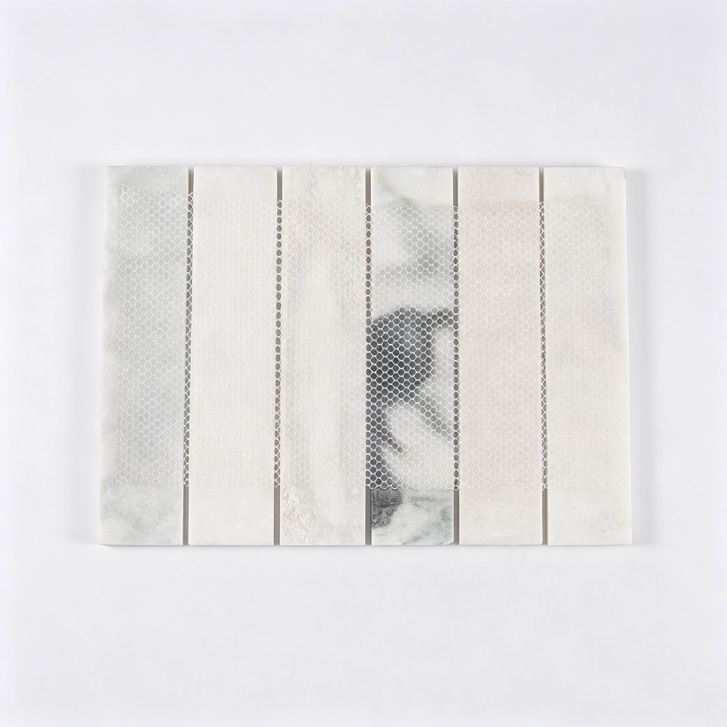 Back view of a white marble strip mosaic tile with flexible mesh backing