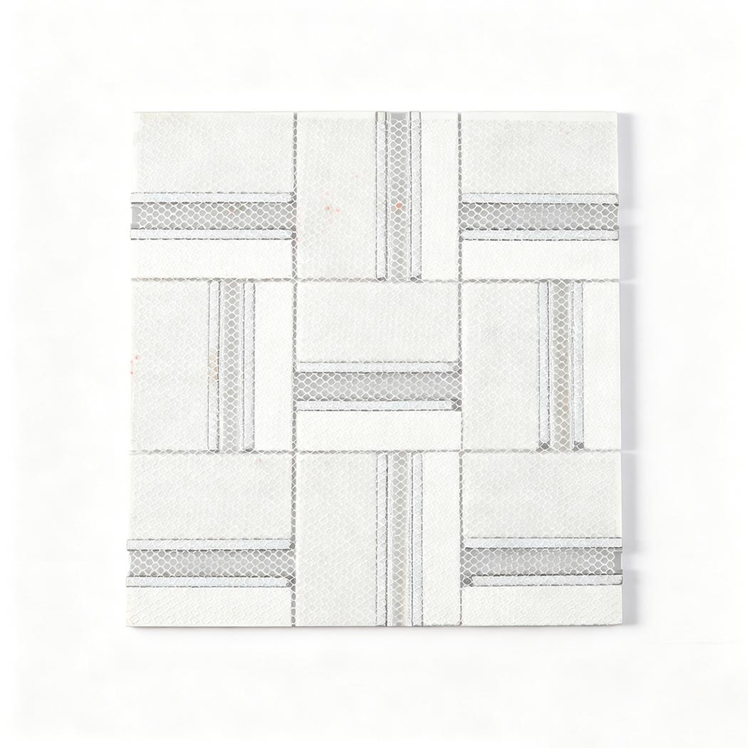 The back view of the mosaic tile sheet showing the white mesh netting adhesive backing.