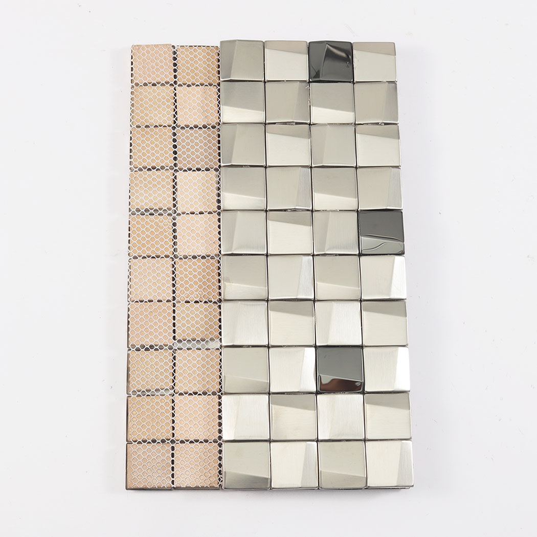 The reverse side of a silver metal mosaic sheet showing the mesh backing for installation.