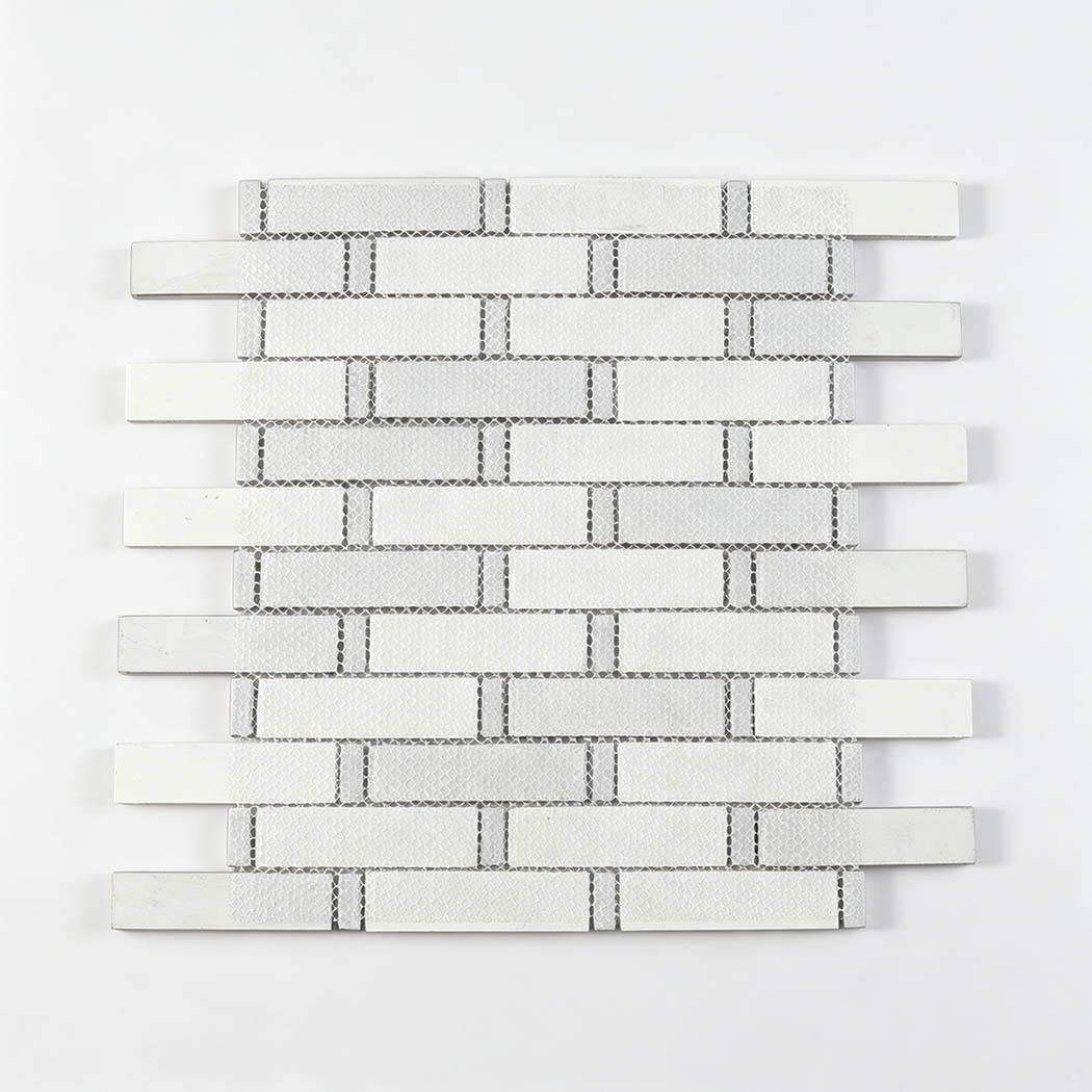 Back view of mesh mounted silver gray glass linear mosaic tile sheet