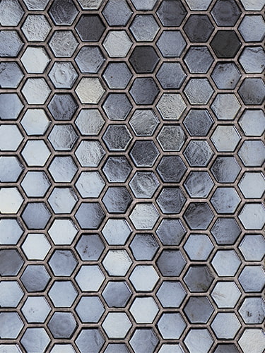 Metallic-effect glass hexagon tiles with glossy finish