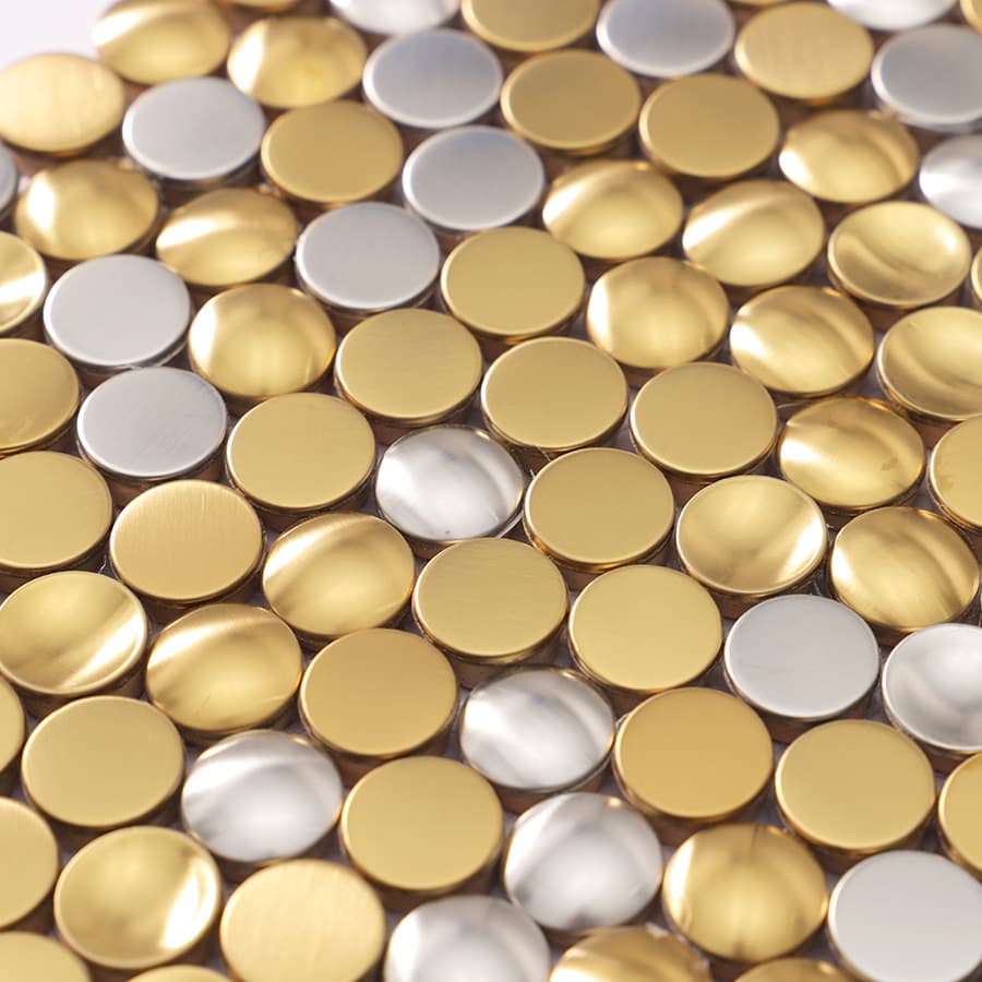 Shiny metallic gold and silver round mosaic tile surface
