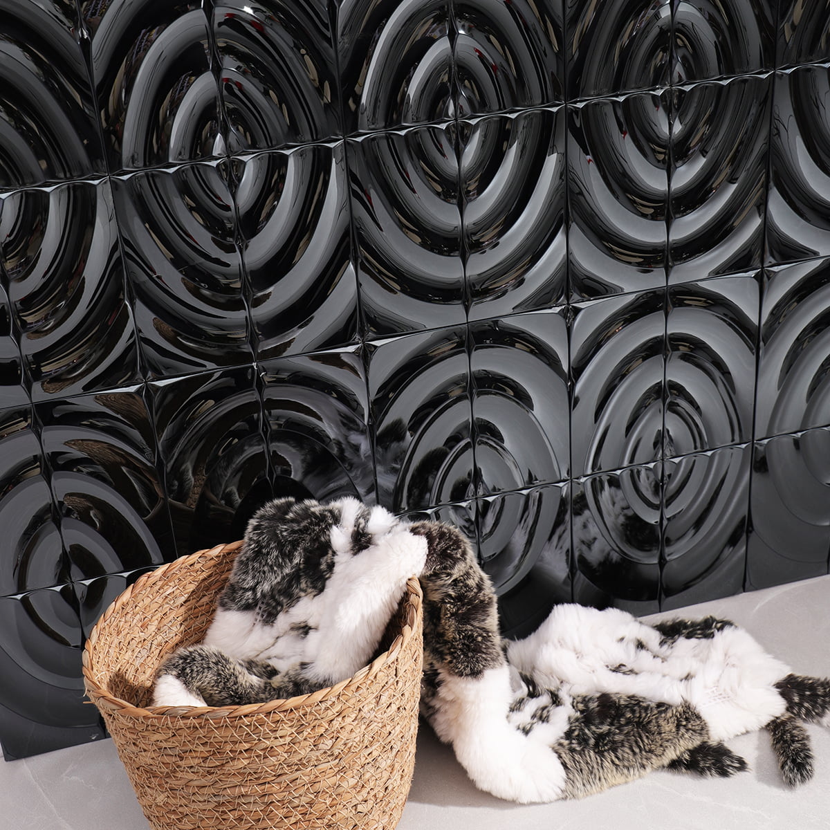 A close-up of metallic tiles with shiny wavy patterns arranged in a grid